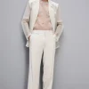 Spodnie slim fit ze wpuszczanymi kieszeniami